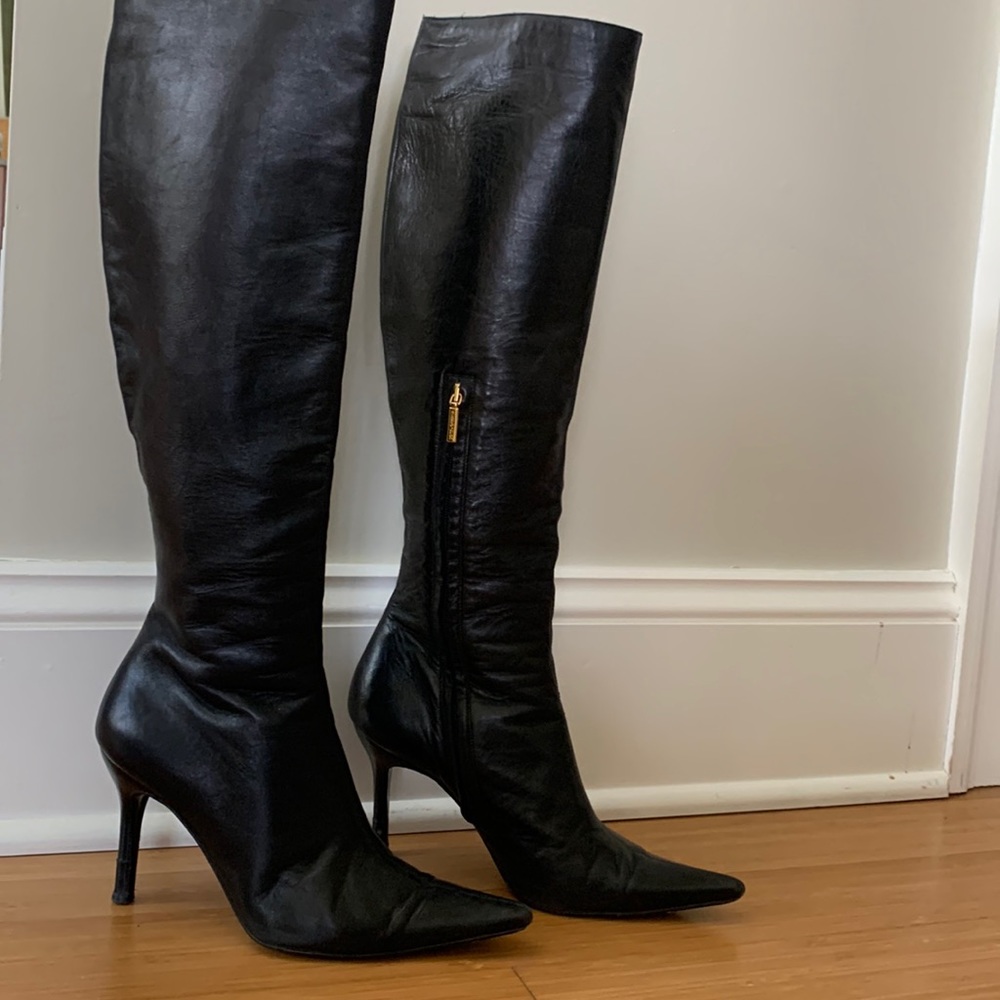 Classic Dolce & Gabbana black stiletto boots. Timeless style.
